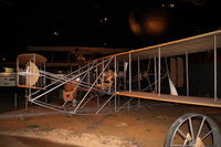UNKNOWN @ KFFO - At the Air Force Museum.  Replica 1909 Military Flyer built by museum personnel in 1955, using engine donated by Orville Wright, and chains, sprockets and propellers donated by heirs of the Wright estate. - by Glenn E. Chatfield