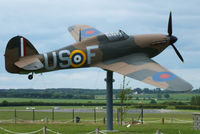 V7313 @ EGSX - Hawker Hurricane 1 (Replica) gate guardian at North Weald - by Chris Hall