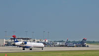 N909FJ @ PIT - A USAir Express Bombardier CL600-2D24 taxiing - by Murat Tanyel