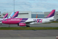 HA-LPU @ EGGW - Wizzair - by Chris Hall