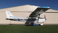 ZK-EOW - At its home hanger in Motueka - by D Milner