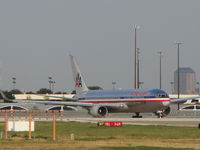 N394AN @ DFW - Waiting to takeoff from runway 18L at DFW Airport - by paulstaf