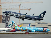N548AS @ KLAX - alaskaair.com with Spirit of Disneyland II