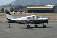 N6025W @ KRNM - Parked on the tarmac - by Nick Taylor