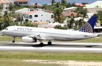 N473UA @ TNCM - N473UA