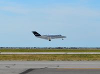 N747JJ @ BKL - N747JJ lands at KBKL on runway 6L/24R. - by aeroplanepics0112