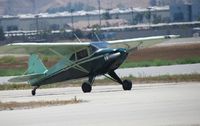 N6126D @ CNO - Stopped awaiting permission to enter taxiway after landing - by Helicopterfriend
