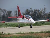 N656DT @ CNO - Looking north and observing the hot exhaust while engine being runup - by Helicopterfriend