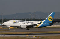 UR-GAU @ LOWW - Ukraine International Boeing 737