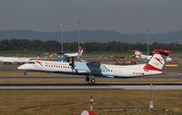 OE-LGL @ LOWW - Austrian Arrows DHC 8 - by Thomas Ranner