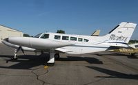 N6387X @ KAXN - Cessna 402B Businessliner on the line. - by Kreg Anderson