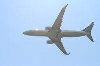 N76504 @ KIAH - UAL B738 departs 9 with the sun high above. - by Darryl Roach