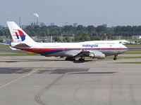 9M-MPN @ EHAM - 8nAMS - by Ferenc Kolos