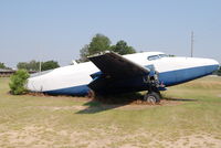 N114CA @ TXK - Aircraft stripped of engines, props and tail section. - by S. Luebbert