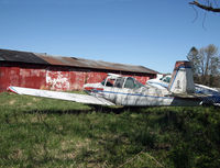 N8274J @ N75 - Three years after I spotted this aircraft, it had been moved to the front of the airport and unceremoniously dumped there, looking even more ragged than before. - by Daniel L. Berek