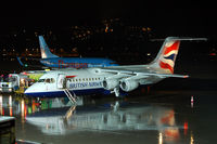 G-CFAA @ LOWI - A very wet Ramp. (Published in Innsbruck  Airport