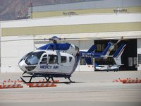N145LF @ SBD - Parked at the Fire Station area with N207TF in the background - by Helicopterfriend