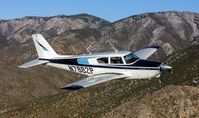 N7882P - This image was the cover of the April 2007 edition of Comanche Flyer.  It is owned, and being piloted by, Robert Waters.