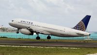 N402UA @ TNCM - N402UA
