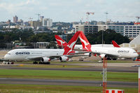 VH-OQD @ YSSY - Some serious heavy metal around... - by Micha Lueck