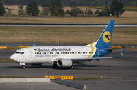 UR-GBA @ LOWW - Ukraine International Boeing 737 - by Thomas Ranner