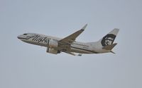 N614AS @ KLAX - Departing LAX on 25R - by Todd Royer