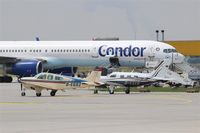 D-EGOZ @ EDDP - The aircraft I´m talking about is the fawn and blue flea in front of the giant....... - by Holger Zengler