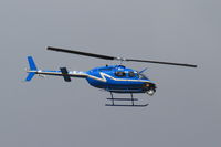 N20712 - Taken in Oklahoma City. Is that a FLIR unit mounted under the nose? - by Tom Smith