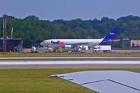N654FE @ PIT - Being loaded at PIT.