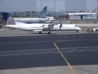 N196WQ @ EWR - dash-8 ready to leave newark - by christian maurer