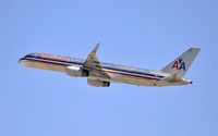 N699AN @ KLAX - Departing LAX on 25R - by Todd Royer