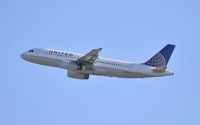 N480UA @ KLAX - Departing LAX on 25R - by Todd Royer