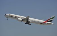 A6-EGC @ KLAX - Departing LAX on 25R - by Todd Royer