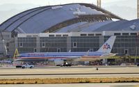 N666A @ KLAX - Taxiing for departure - by Todd Royer