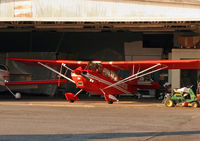 N53836 @ KVAY - A sporty 1975 Citabria receives attention at a hangar at a remote corner of South Jersey Regional Airport. - by Daniel L. Berek