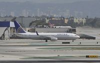 N26215 @ KLAX - Taxiing to gate at LAX - by Todd Royer