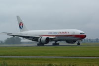 B-2079 @ EHAM - Landing on the Polderbaanat Schiphol in the rain - by Jan Bekker