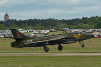 SE-DXM @ ESCF - Hawker Hunter landing at Malmen Air Base, Sweden. It is operated by the Västgöta Veteranflygförening. - by Henk van Capelle