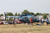 N407LG - On display at North Liberty, IA during grand opening of local shopping center. - by Glenn E. Chatfield