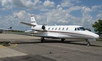 N602QS @ KAXN - Cessna 560 Citation Excel at the fuel pump.