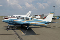N8817Y @ ELN - Nice Twin Comanche - by Duncan Kirk