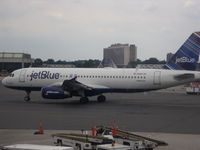N597JB @ EWR - FOR THE LOVE OF BLUE - by christian maurer