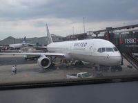 N57111 @ EWR - working on the 757 - by christian maurer