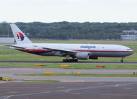 9M-MRM @ AMS - Taxi to runway L18 of Schiphol Airport - by Willem Göebel