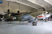N1941P @ 42VA - 1941 Curtiss Wright P-40E Kittyhawk N1941P parked in the hangar at the Military Aviation Museum. - by Dean Heald
