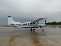 N969TC @ OJA - at Weatherford, OK on a very wet Sunday in May 2012 - by Graham Tiller
