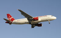N638VA @ KLAX - Arriving at LAX on 24R - by Todd Royer