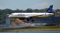 N589JB @ KDCA - Landing DCA - by Ronald Barker