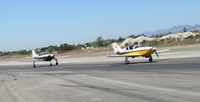 N69BC @ CCB - 2 plane taxi back to Maniac Mike's Cafe parking area - by Helicopterfriend
