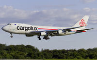 LX-OCV @ ELLX - short final RW06 - by Friedrich Becker